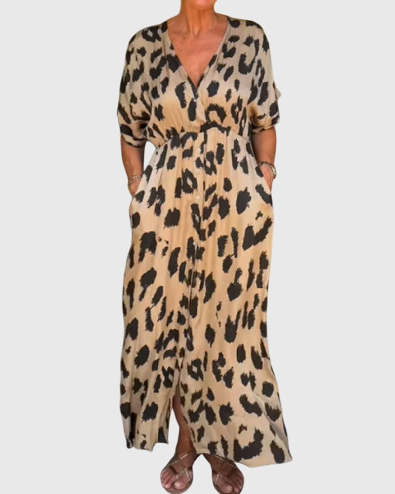 Women's flowy leopard print maxi dress with V-neck, perfect for summer casual or evening wear.