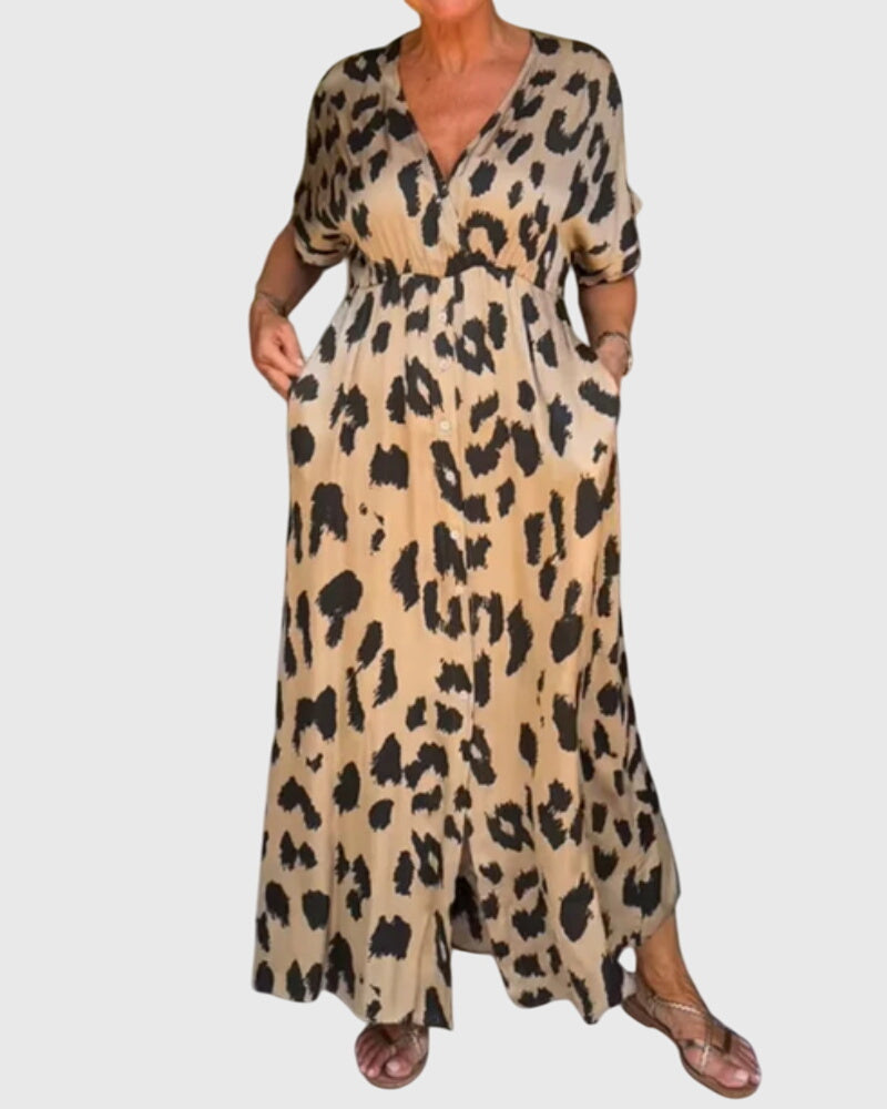 Elegant women's patterned leopard print maxi dress, flattering V-neck, and elastic waist.