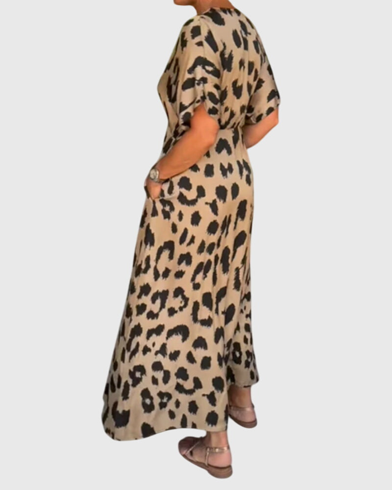 Versatile women's leopard print V-neck maxi dress with elastic waist, suitable for day or evening.