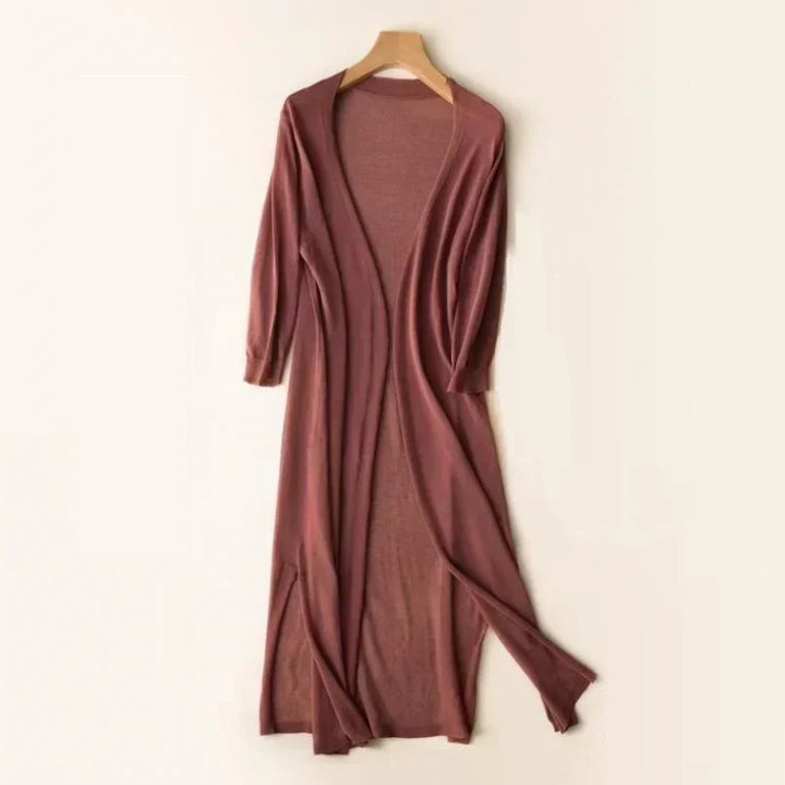 Women's flowy long cardigan with stylish side slits. Perfect open-front layering for spring and summer.