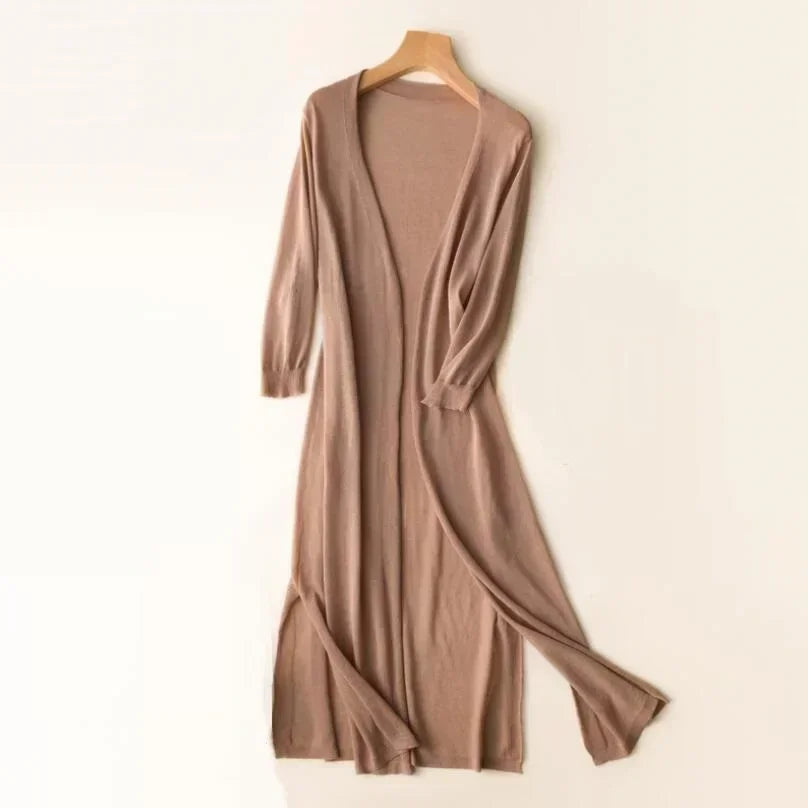 Versatile women's long cardigan with side slits, perfect as a spring/summer layering piece. Flowy & stylish.