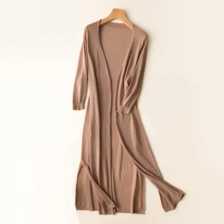 Versatile women's long cardigan with side slits, perfect as a spring/summer layering piece. Flowy & stylish.