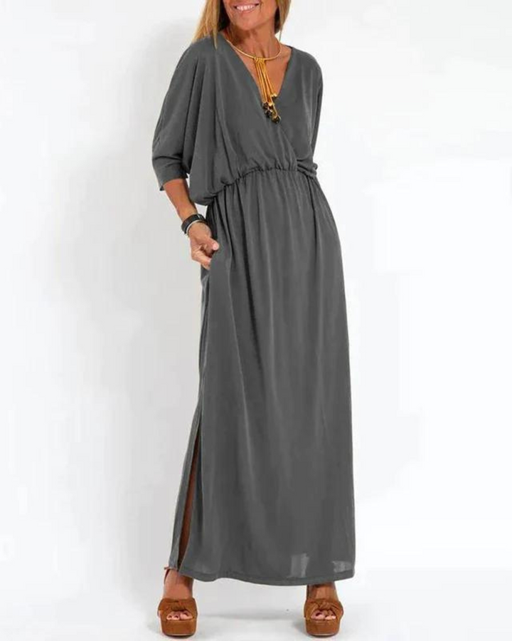 Comfortable women's flowy midi dress, a-line silhouette, adjustable straps. Versatile for summer casual wear.