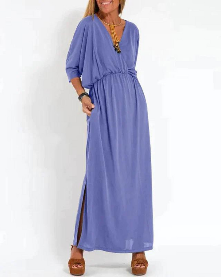 Flowy long midi dress for women, with adjustable spaghetti straps. Comfortable and versatile for summer days.