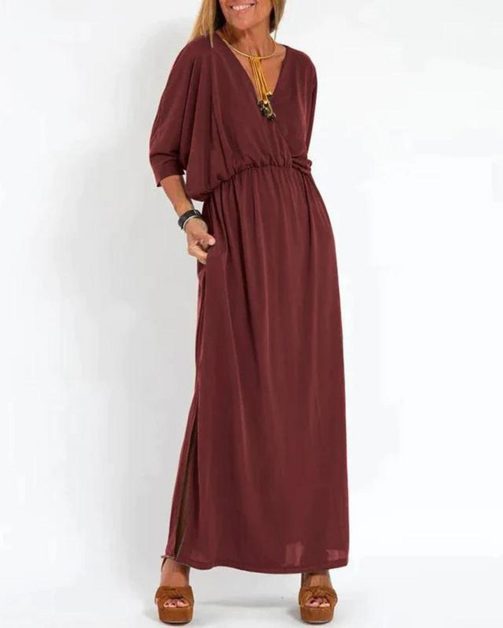 Plus size women's flowy long midi dress, sleeveless with adjustable straps. Comfortable summer casual wear.