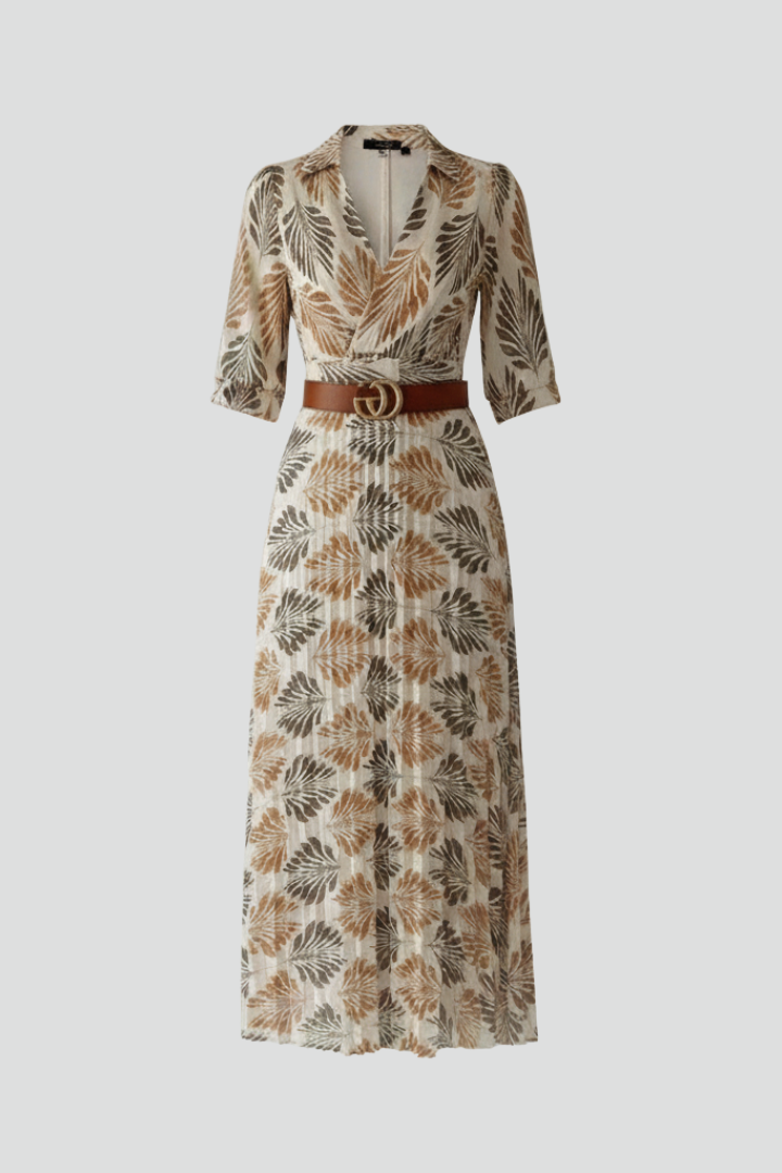 Women's flowy maxi dress with elegant patterned print. Perfect for summer & spring casual wear.