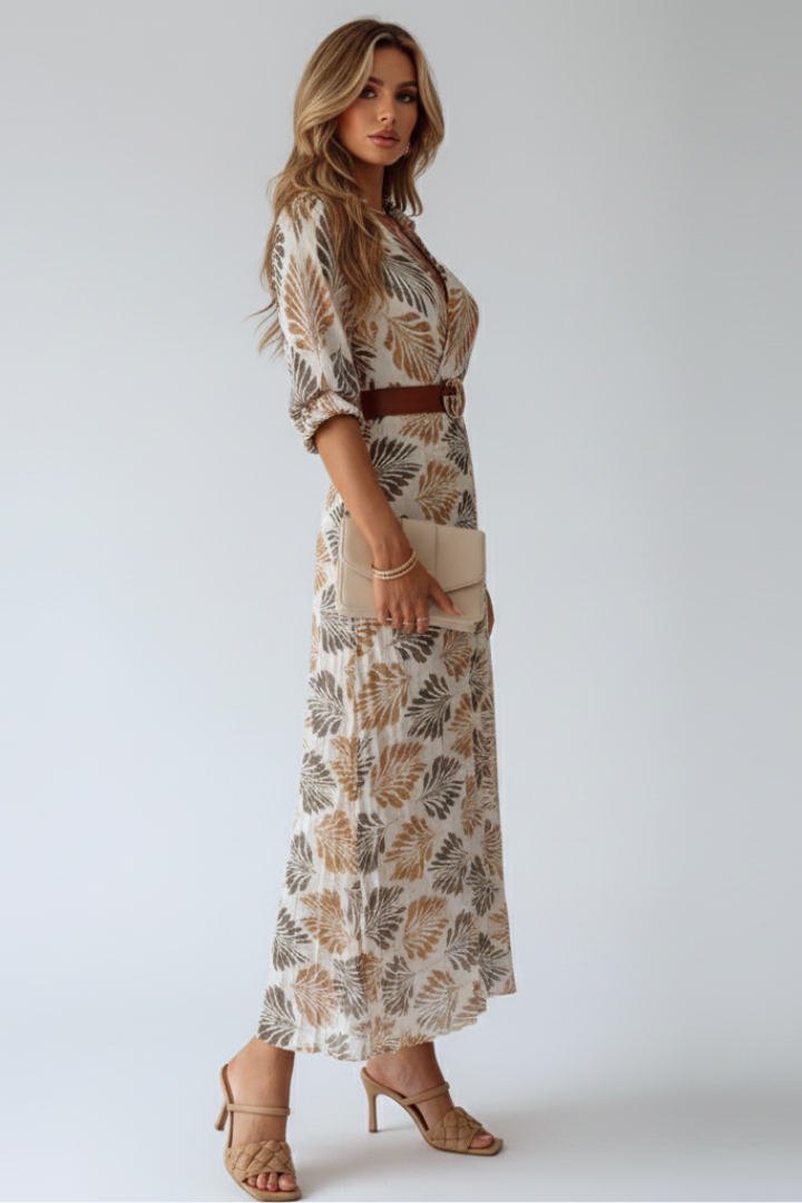 Elegant women's patterned flowy maxi dress. Versatile casual printed dress for spring/summer.