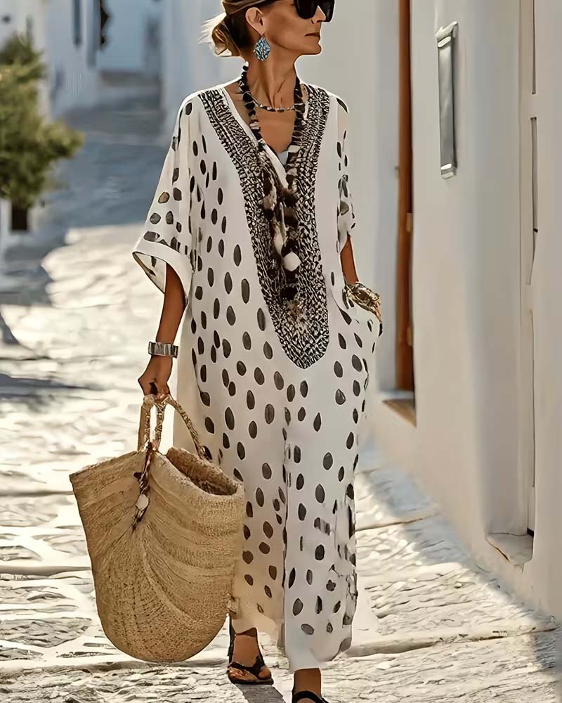Flowy women's embroidered polka dot maxi kaftan dress, a chic V-neck beach cover-up and summer staple.