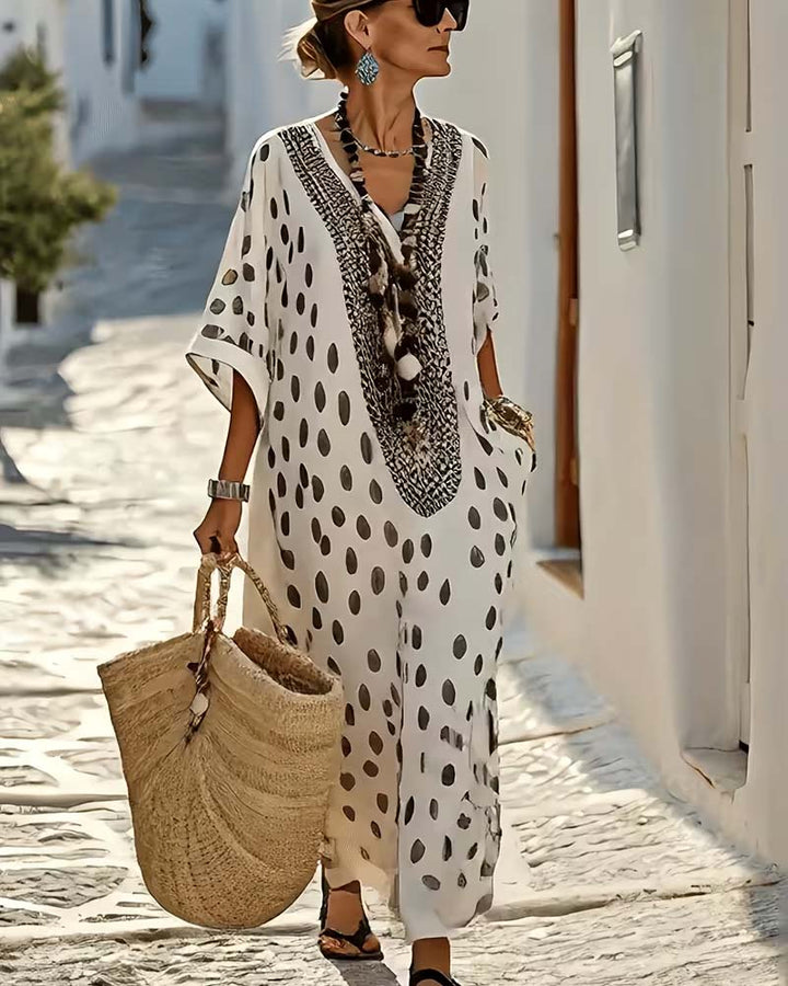 Flowy women's embroidered polka dot maxi kaftan dress, a chic V-neck beach cover-up and summer staple.