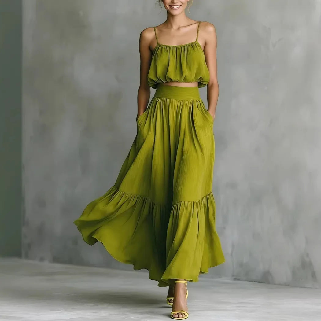 Women's flowy ruffle maxi skirt & spaghetti strap crop top set. Perfect for beachwear or summer vacation.