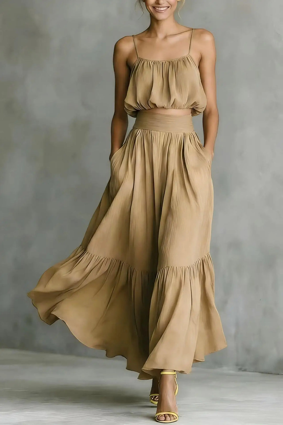 Comfortable women's flowy maxi skirt & crop top set. Chic two-piece vacation outfit with ruffle detail.