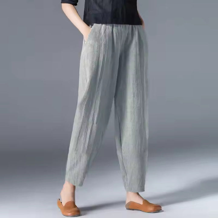 Women's relaxed fit flowy summer trousers with elastic waist. Offering breathable all-day comfort, ideal for travel.