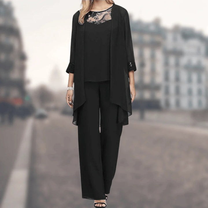 Women's flowy three-piece set with wide-leg pants, a comfortable top, and delicate lace trim for elegant style.
