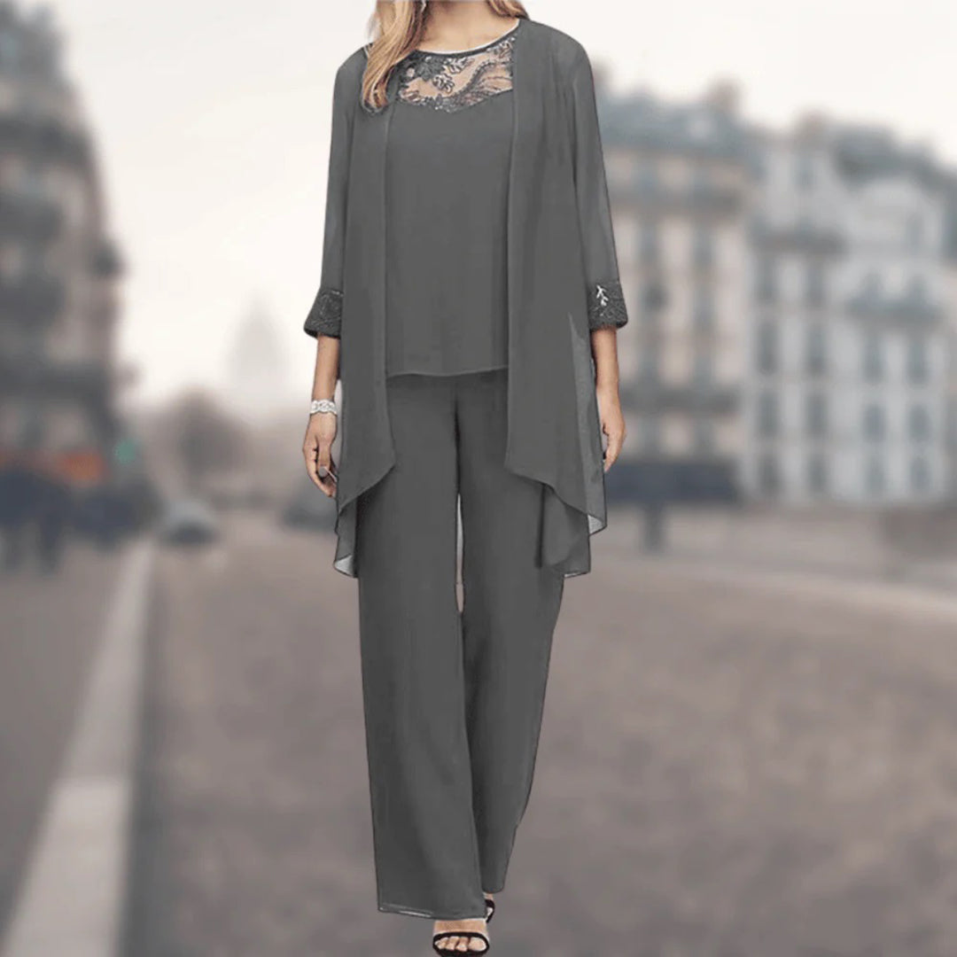 Elegant women's three-piece set: flowy wide-leg pants, matching top, delicate lace trim. Perfect for summer fashion.