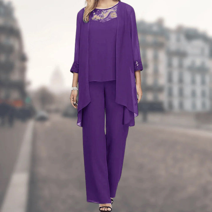 Chic women's flowy three-piece outfit set with wide-leg trousers and a top, detailed with delicate lace trim.