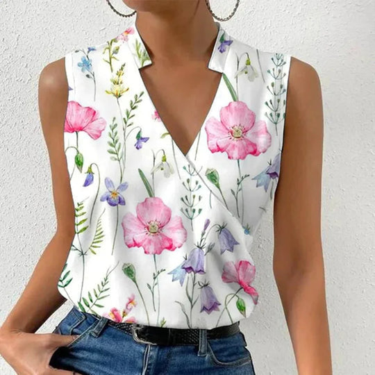 Women's flowy V-neck blouse, lightweight & versatile for summer comfort. Relaxed fit, stylish casual wear.