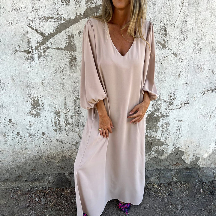 Stylish women's summer maxi dress with eye-catching balloon sleeves & a flattering V-neck cut.