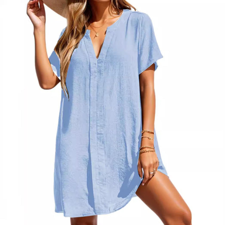 Stylish women's flowy short sleeve sundress with a V-neck, ideal for summer casual and beach outings.