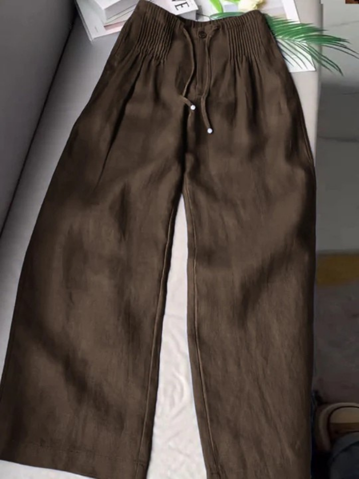 Easy pull-on wide-leg trousers for women, featuring a relaxed fit and elastic waist for comfort.