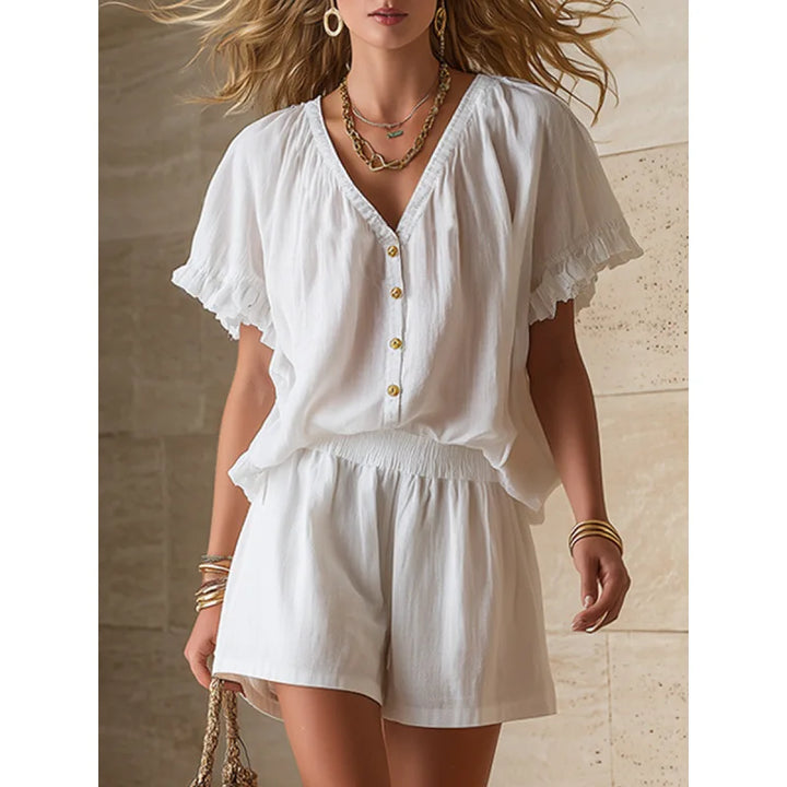 Comfortable women's two-piece shorts outfit with flutter sleeves, designed for relaxed daily wear.