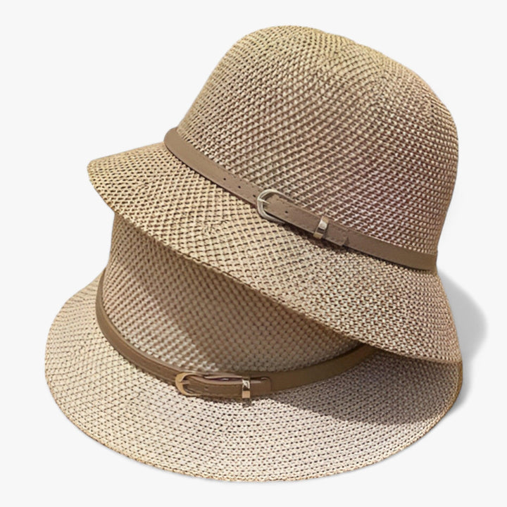 Elegant women's khaki linen sun hat, foldable and lightweight with a stylish bow for sunny days.