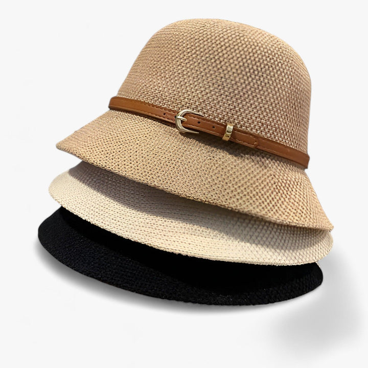 Durable women's foldable linen sun hat with a sophisticated bow, offering sun protection for travel.