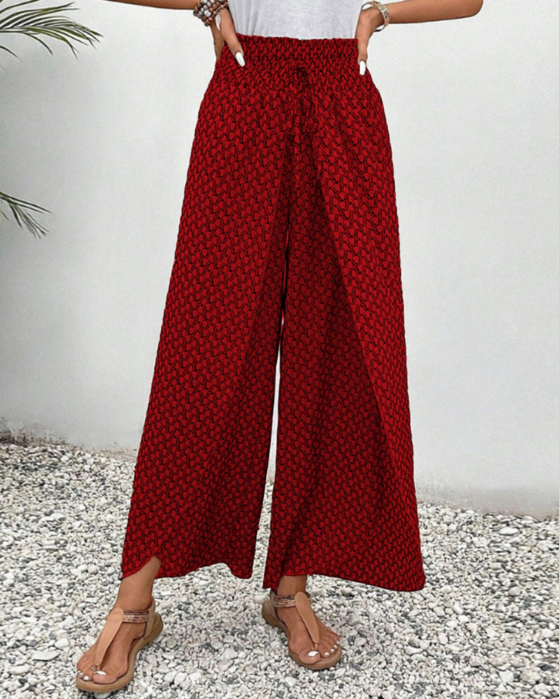 Elegant geometric print wide-leg trousers for women. Perfect versatile fashion, dressed-up casual wear.