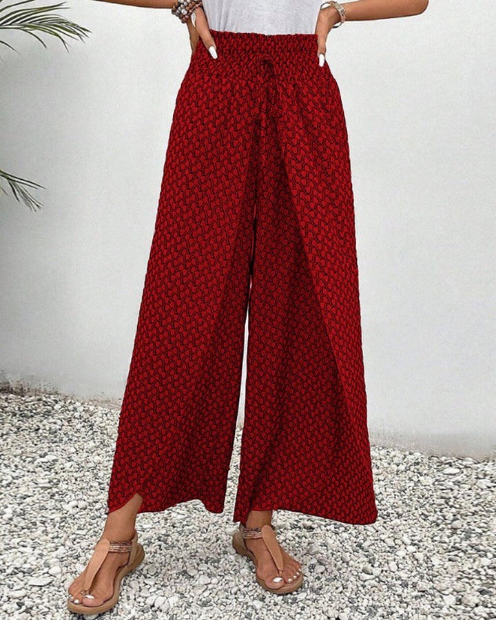 Elegant geometric print wide-leg trousers for women. Perfect versatile fashion, dressed-up casual wear.