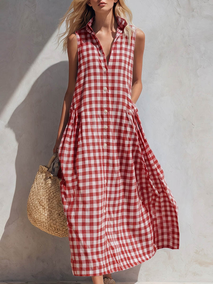 Casual women's sleeveless gingham maxi dress with a collar, offering a relaxed fit for warm weather days.