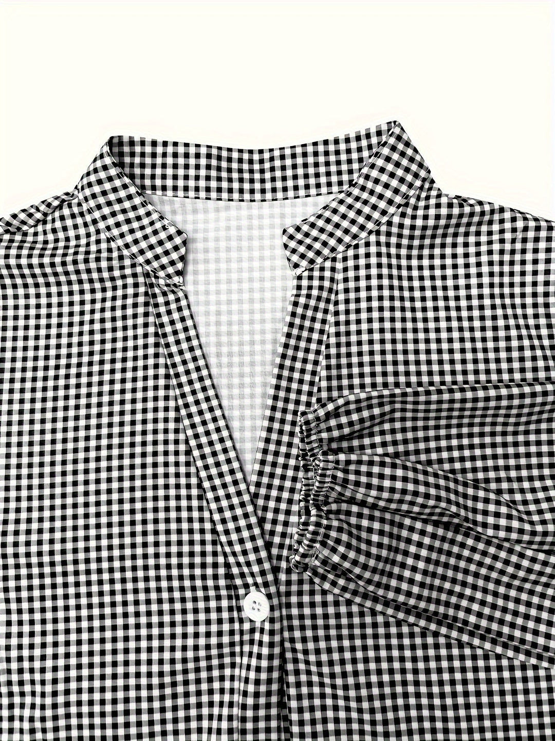 Gingham check print mini dress for women, featuring a button front, tiered ruffle hem, and puff sleeves.