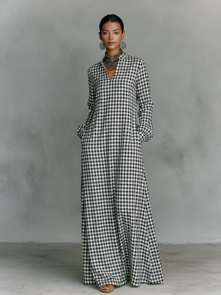 Chic women's gingham V-neck long sleeve maxi dress. Casual, versatile spring/summer wear with a relaxed, elegant fit.