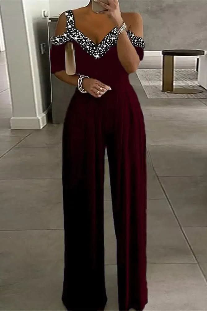 Women's glam rhinestone jumpsuit for evening parties. Sparkle and effortless chic, perfect for special occasions.