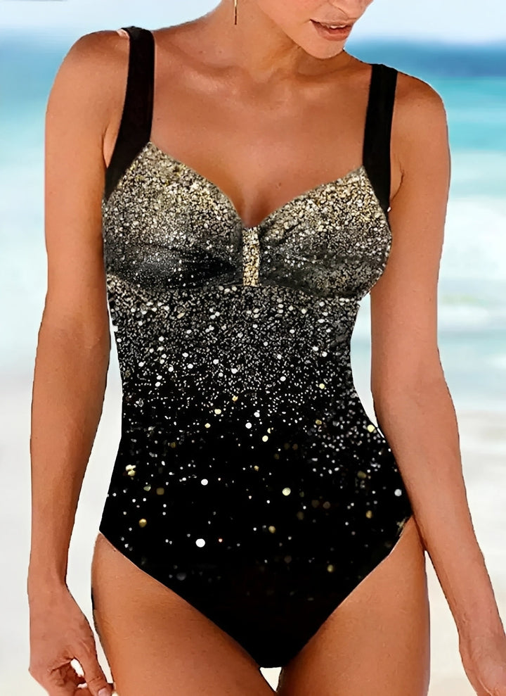 Chic women's glitter push-up one-piece swimsuit. Features a sculpting fit, sequin details, and perfect for summer.