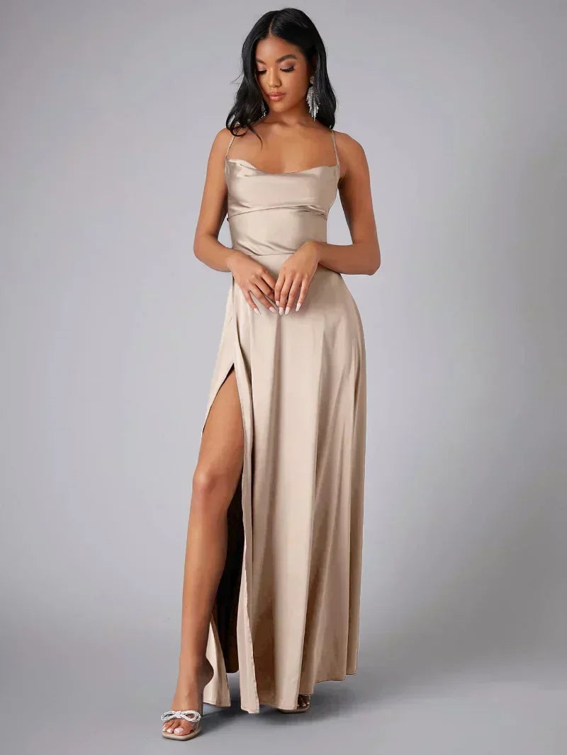 Women's glamorous maxi evening dress with high slit & open back for formal events.