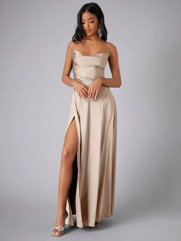 Women's glamorous maxi evening dress with high slit & open back for formal events.