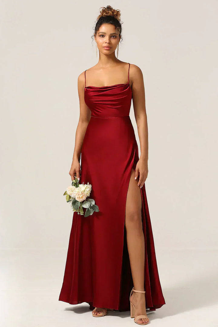 Women's glamorous maxi evening dress with high slit, open back, ideal for formal parties & galas.