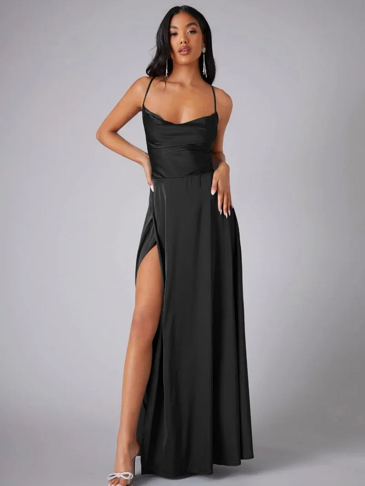 Flowy women's glamorous maxi formal dress, featuring a high slit & elegant open back for movement.