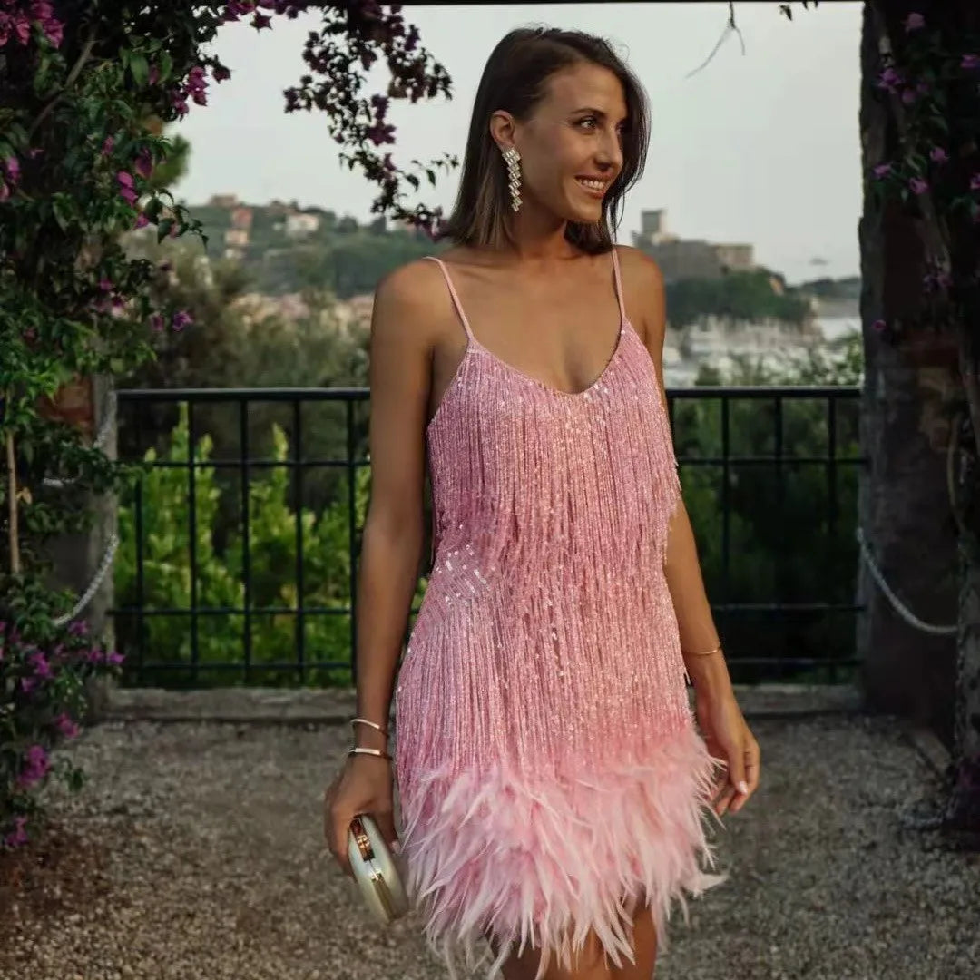 Shimmering women's sequin fringe mini dress, a chic party and evening cocktail outfit for glamorous nights.