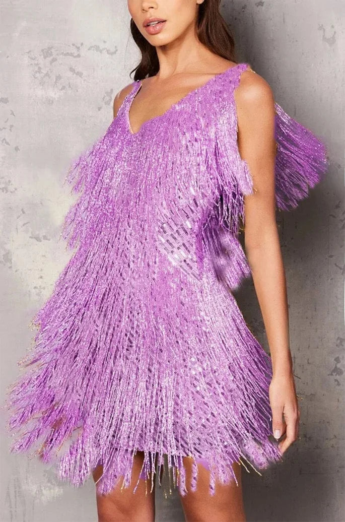 Women's glamorous sequin fringe tiered mini party dress, perfect for dancing.