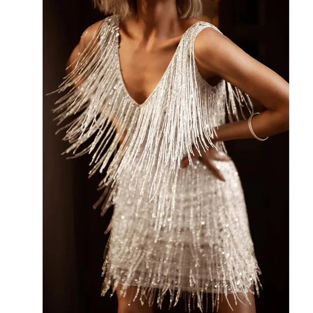 Sparkling women's sequin fringe party mini dress, ideal for celebrations & dance.
