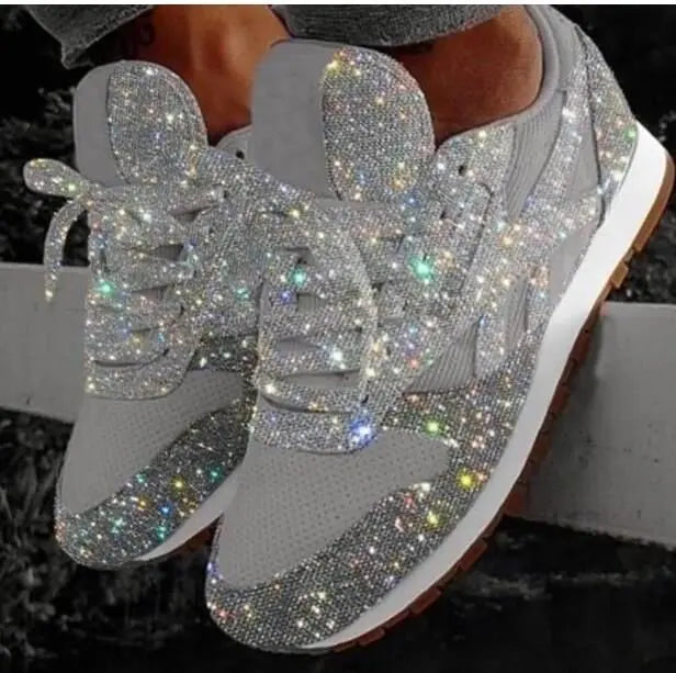 Chic women's glitter lace-up sneakers, adding a sparkle and modern statement to everyday outfits.