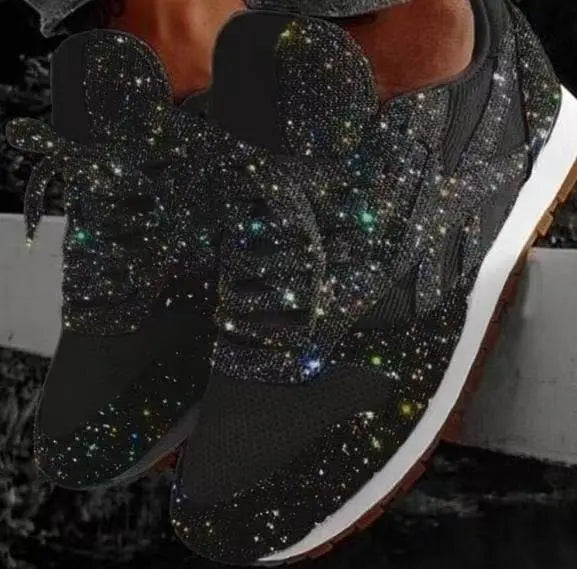 Stylish women's lace-up sneakers featuring dazzling glitter and a comfortable design for casual fashion.