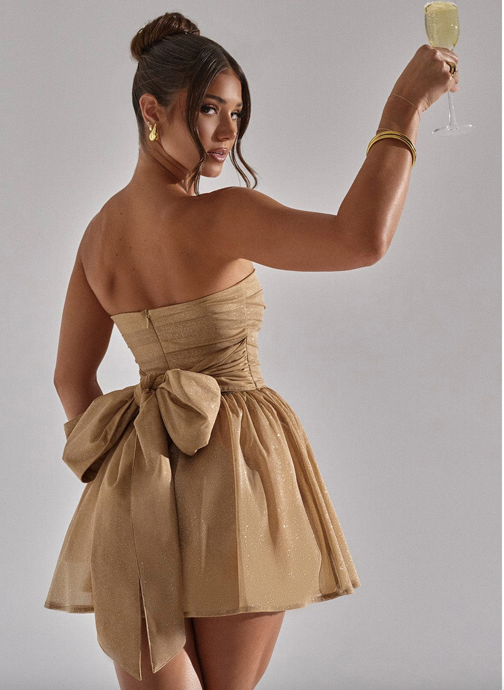Strapless glitter skater mini dress, ideal for homecoming, parties, and formal cocktail events.