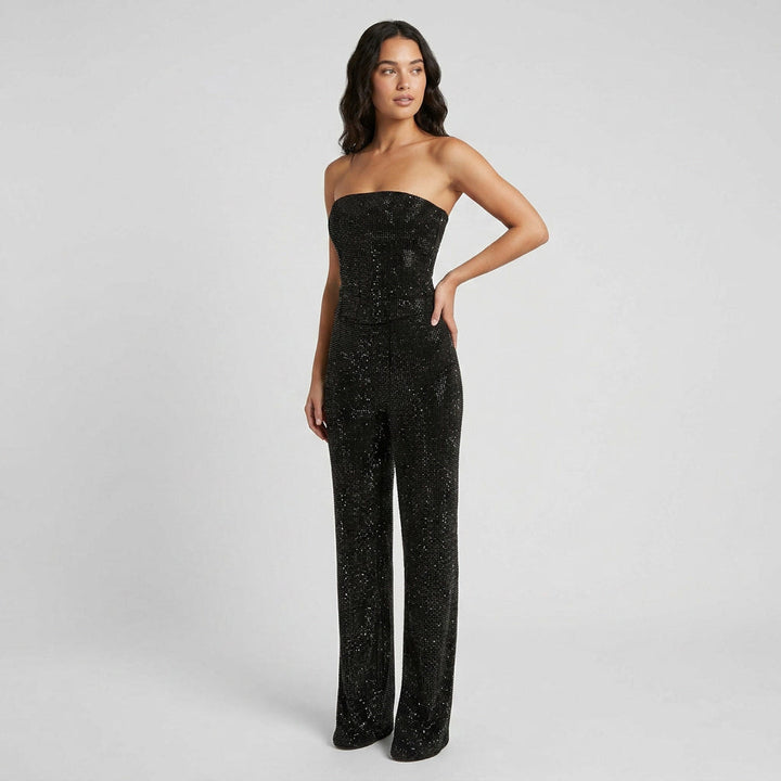 Glamorous women's two-piece set featuring a shimmering top & stylish high-waist denim jeans.