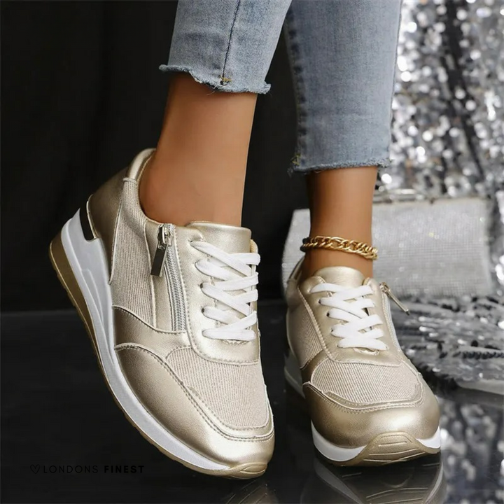Women's gold arch support sneakers with cushioned comfort, ideal for walking & everyday wear.