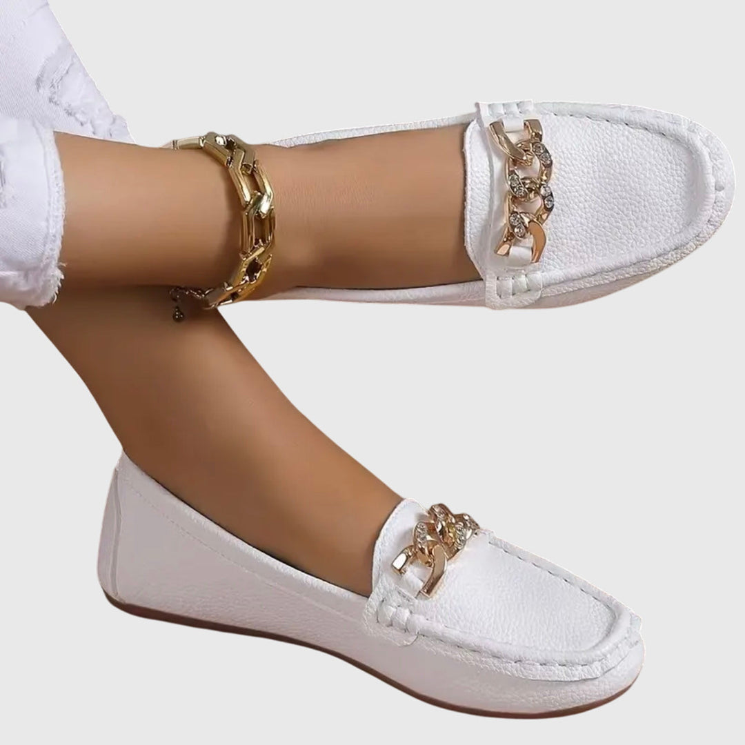 Women's gold-chain wedge loafers, comfortable slip-ons for versatile wear.