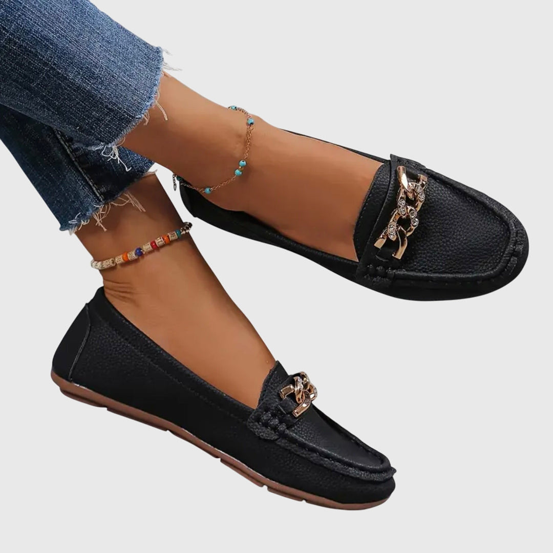 Comfortable women's wedge loafers, featuring chic gold chain embellishment and secure fit.