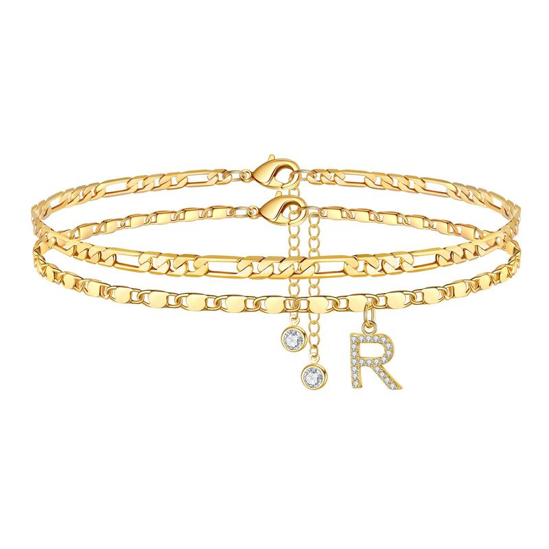 Women's gold initial 'O' anklet featuring a crystal charm, adjustable stainless steel jewelry