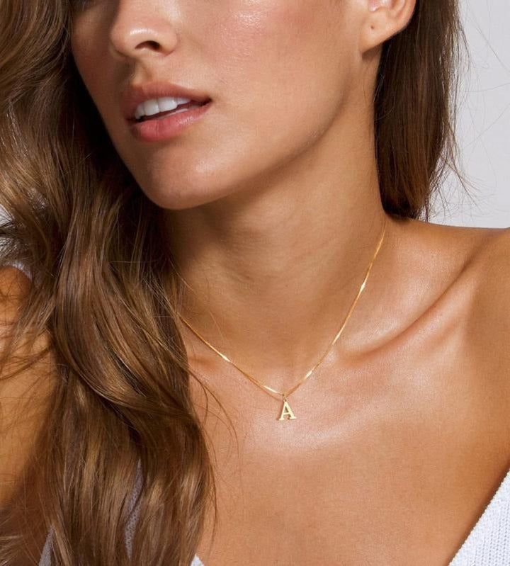 Women's gold plated initial pendant necklace, elegant and personalized