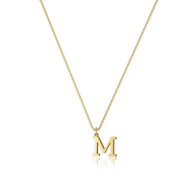 Women's gold initial pendant, a minimalist and elegant statement piece